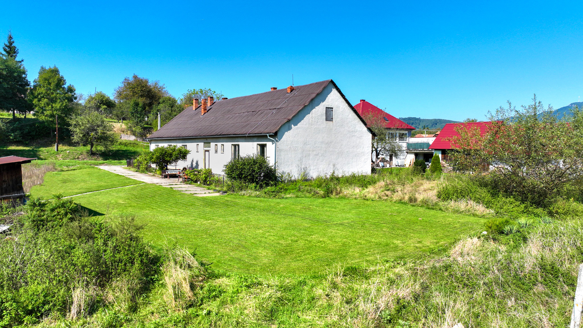 Rodinný dom so štyrmi bytovými jednotkami v obci Beluj