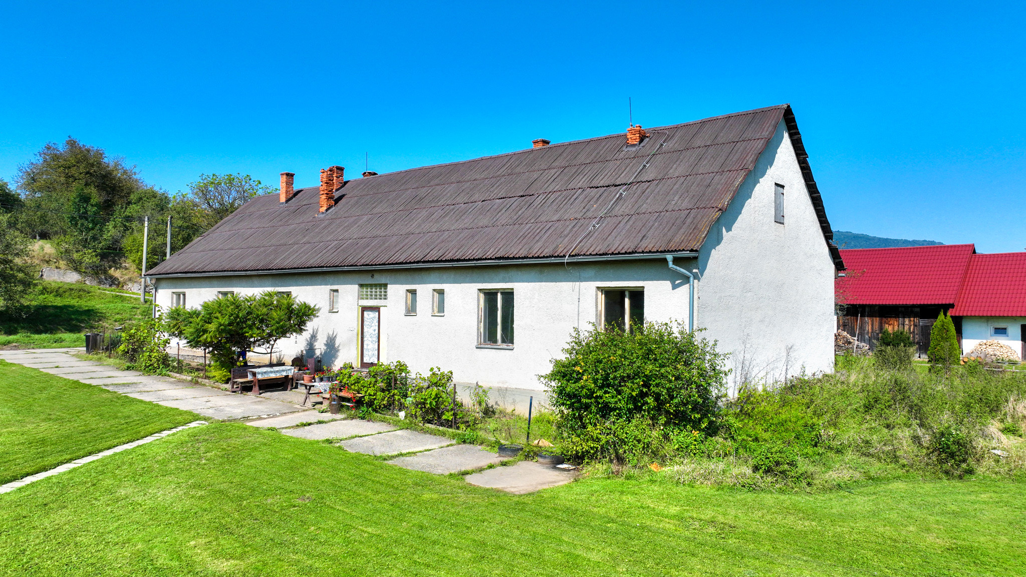 Rodinný dom so štyrmi bytovými jednotkami v obci Beluj