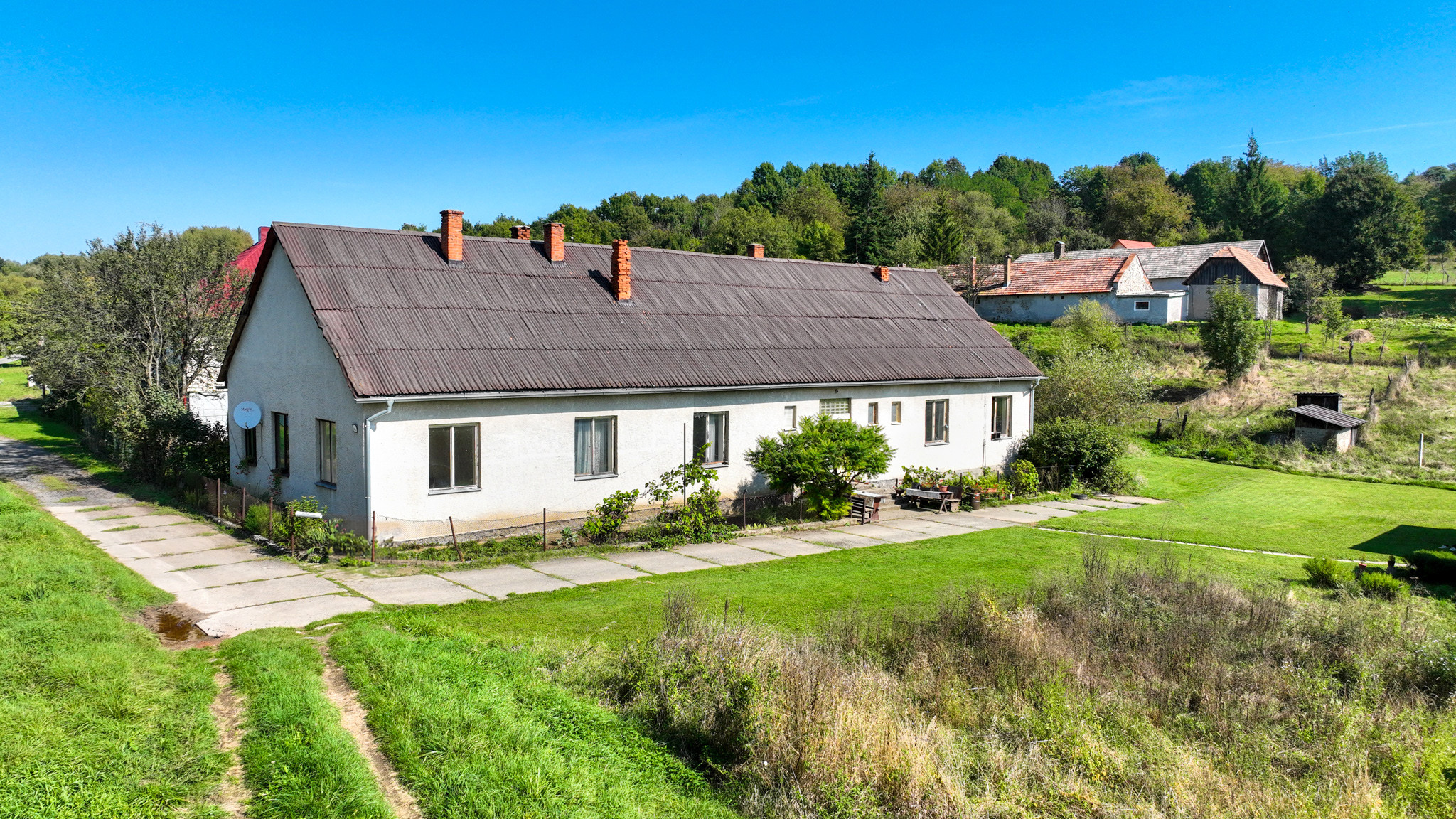 Rodinný dom so štyrmi bytovými jednotkami v obci Beluj
