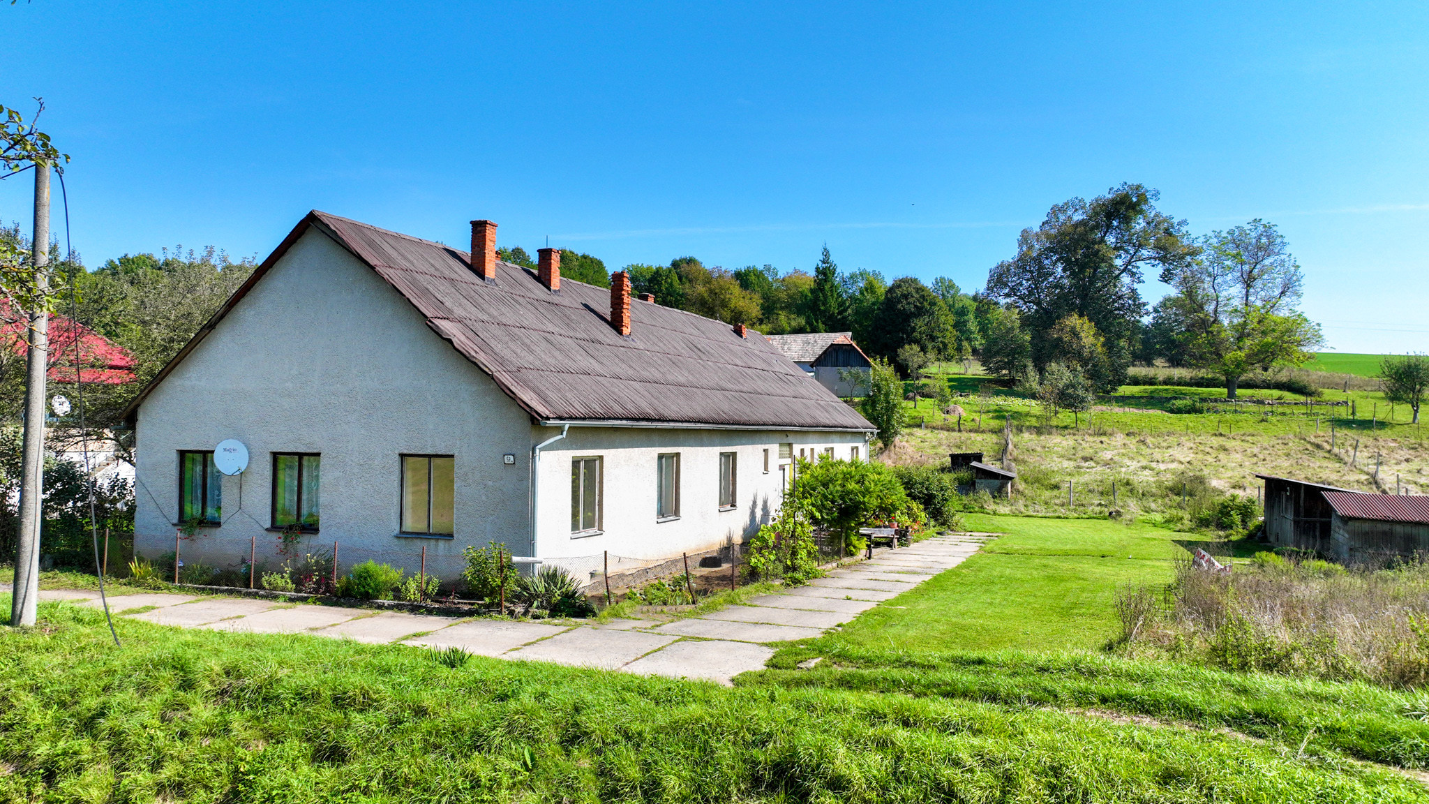 Rodinný dom so štyrmi bytovými jednotkami v obci Beluj