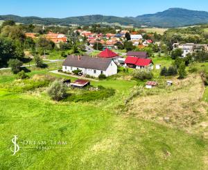 Slnečný, stavebný pozemok o veľkosti 1524m2 v obci Beluj