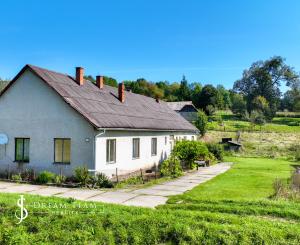 Rodinný dom so štyrmi bytovými jednotkami v obci Beluj