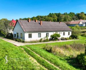 Rodinný dom so štyrmi bytovými jednotkami v obci Beluj