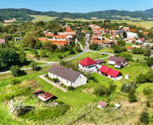 Rodinný dom so štyrmi bytovými jednotkami v obci Beluj