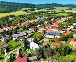 Rodinný dom so štyrmi bytovými jednotkami v obci Beluj