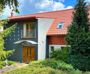 Rodinný dom s 5 bytovými jednotkami a s krásnou záhradou