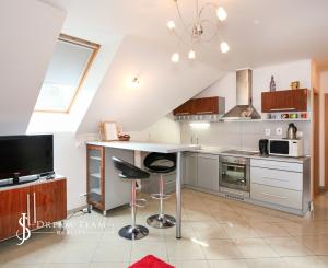 Rodinný dom s 5 bytovými jednotkami a s krásnou záhradou