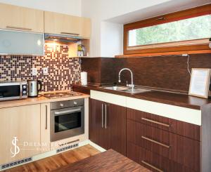 Rodinný dom s 5 bytovými jednotkami a s krásnou záhradou