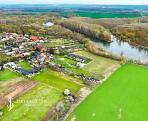 Zabehnutá menšia farma s pozemkom 3800m2 Želiezovce