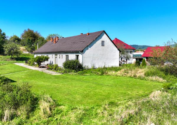 Rodinný dom so štyrmi bytovými jednotkami v obci Beluj