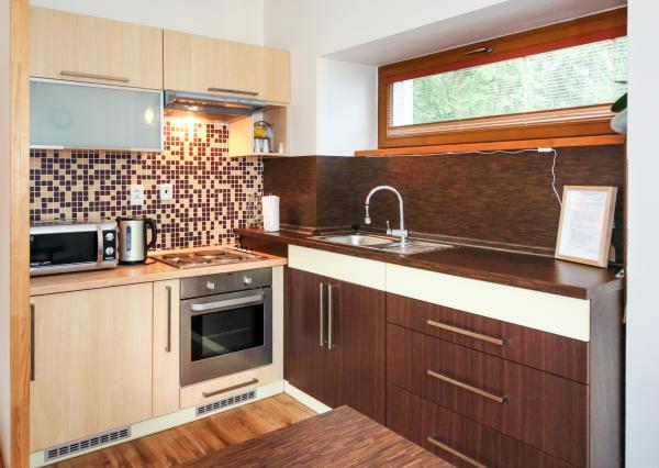 Rodinný dom s 5 bytovými jednotkami a s krásnou záhradou